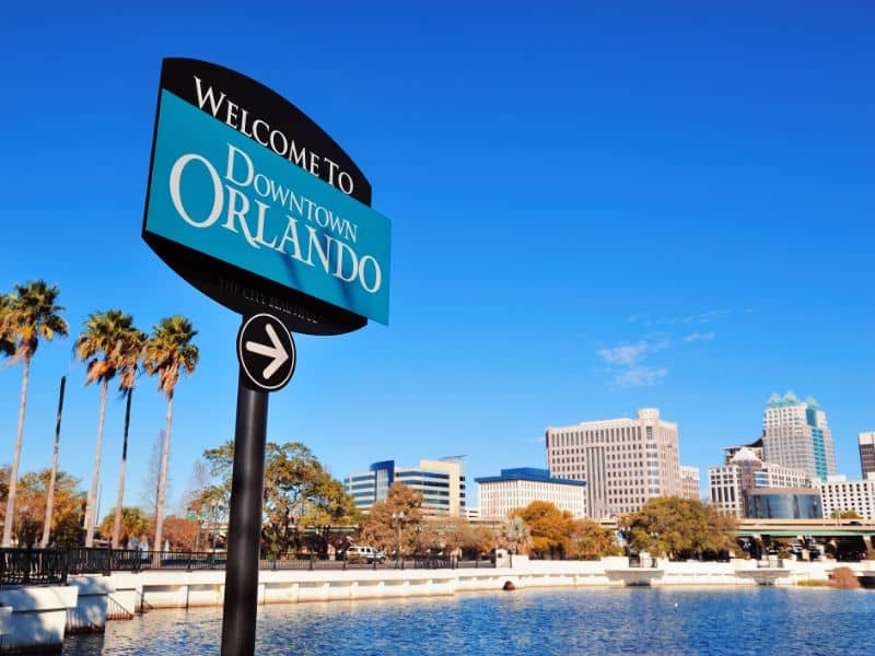 Lake Lucerne in Orlando, FL with city skyline and waterfront view representing Orlando Land Surveying services for residential and commercial properties in the Orlando area