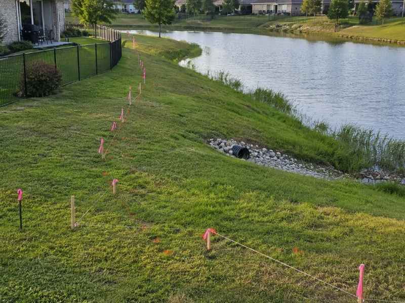 Property survey for fence placement beside a retention pond in Orlando Florida